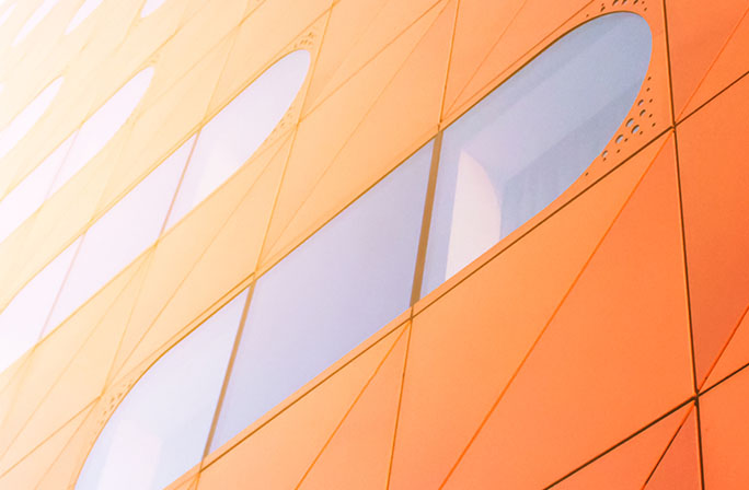 Orange wall with blue windows